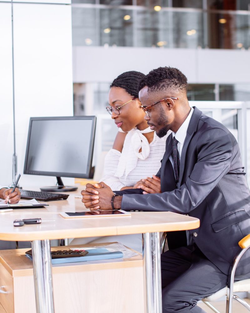 http://www.dreamstime.com/stock-image-smiling-african-couple-buying-new-car-new-car-showroom-african-couple-getting-car-key-dealer-showroom-signing-image111975711